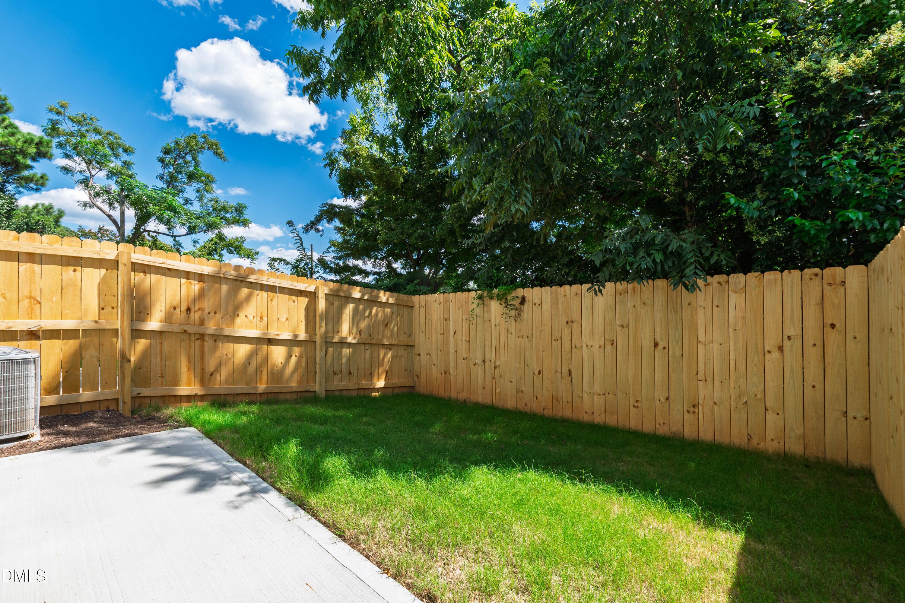 1508 Boyer Street Raleigh, NC 27610 - Photo 49 of 52 a view of a backyard with a fence