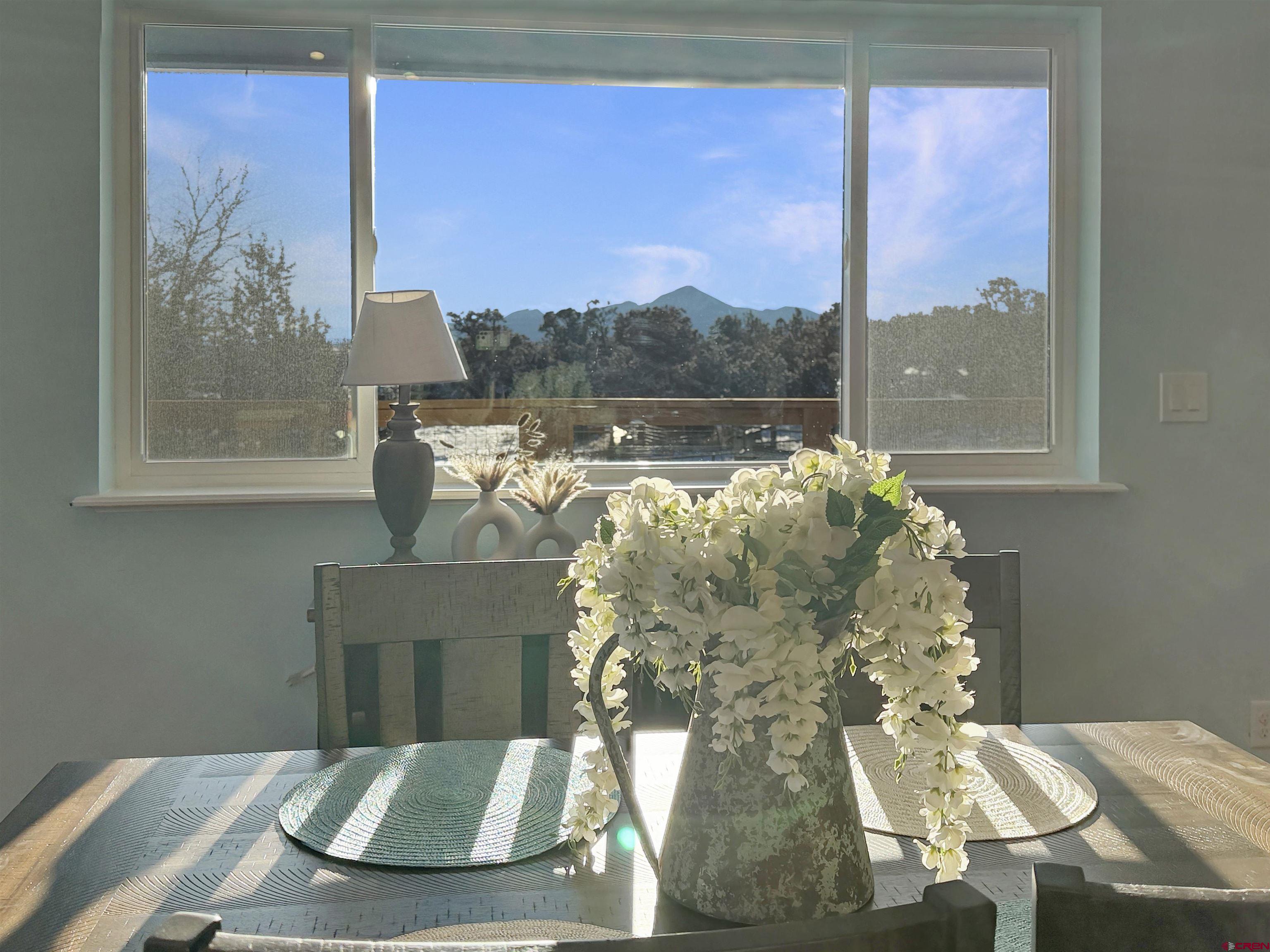 27425 Rd P.7 Dolores, CO 81323 - Photo 2 of 45 a vase of flowers sitting on a table