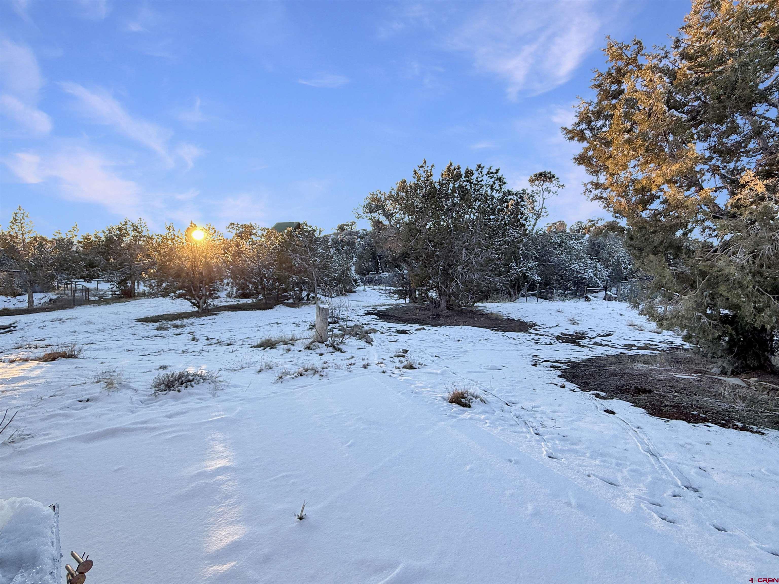 27425 Rd P.7 Dolores, CO 81323 - Photo 29 of 45 a view of a beach with a snow in the background
