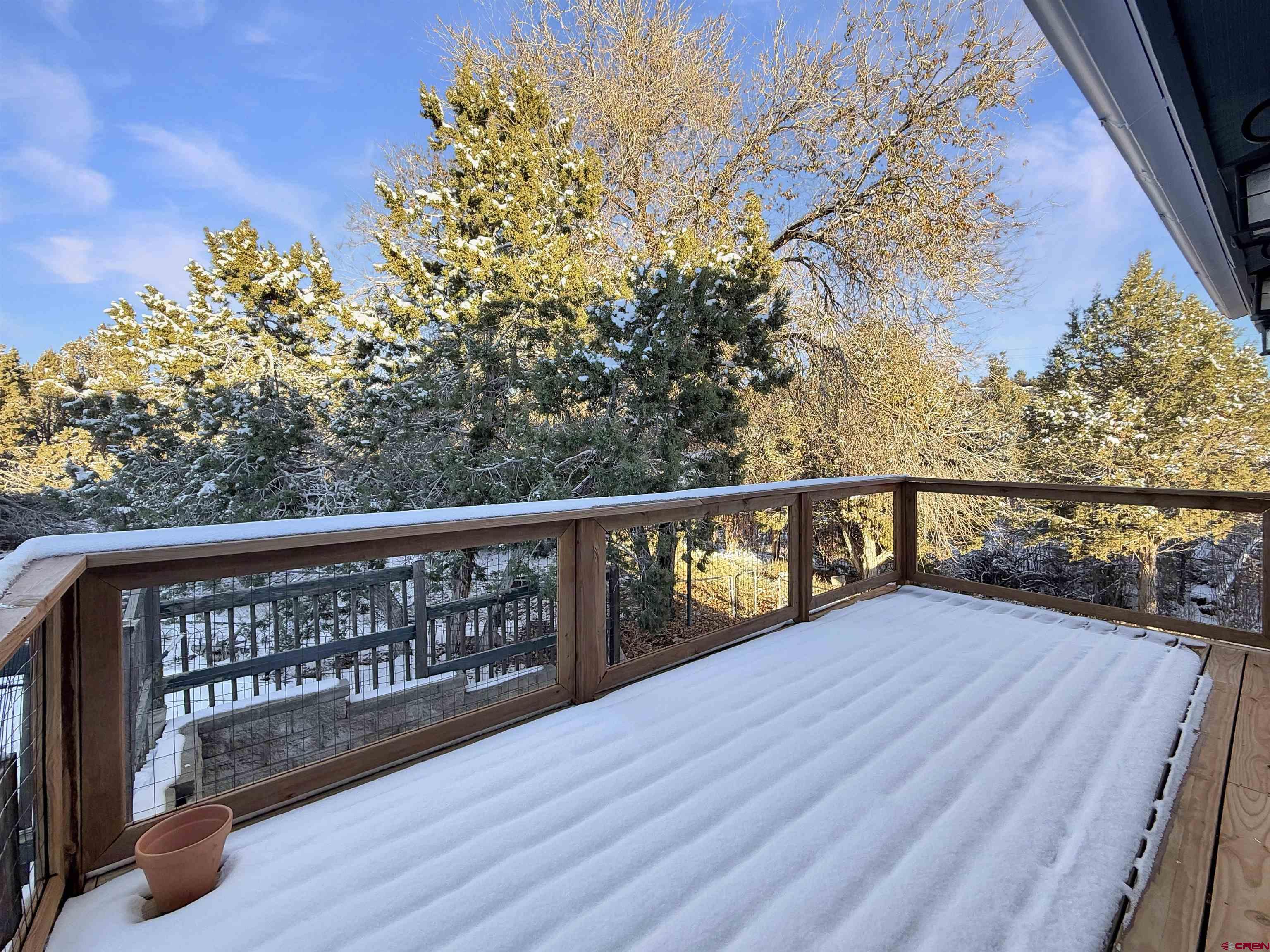 27425 Rd P.7 Dolores, CO 81323 - Photo 38 of 45 a view of balcony with wooden floor and fence
