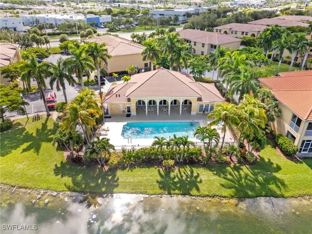an aerial view of a house with a garden and plants