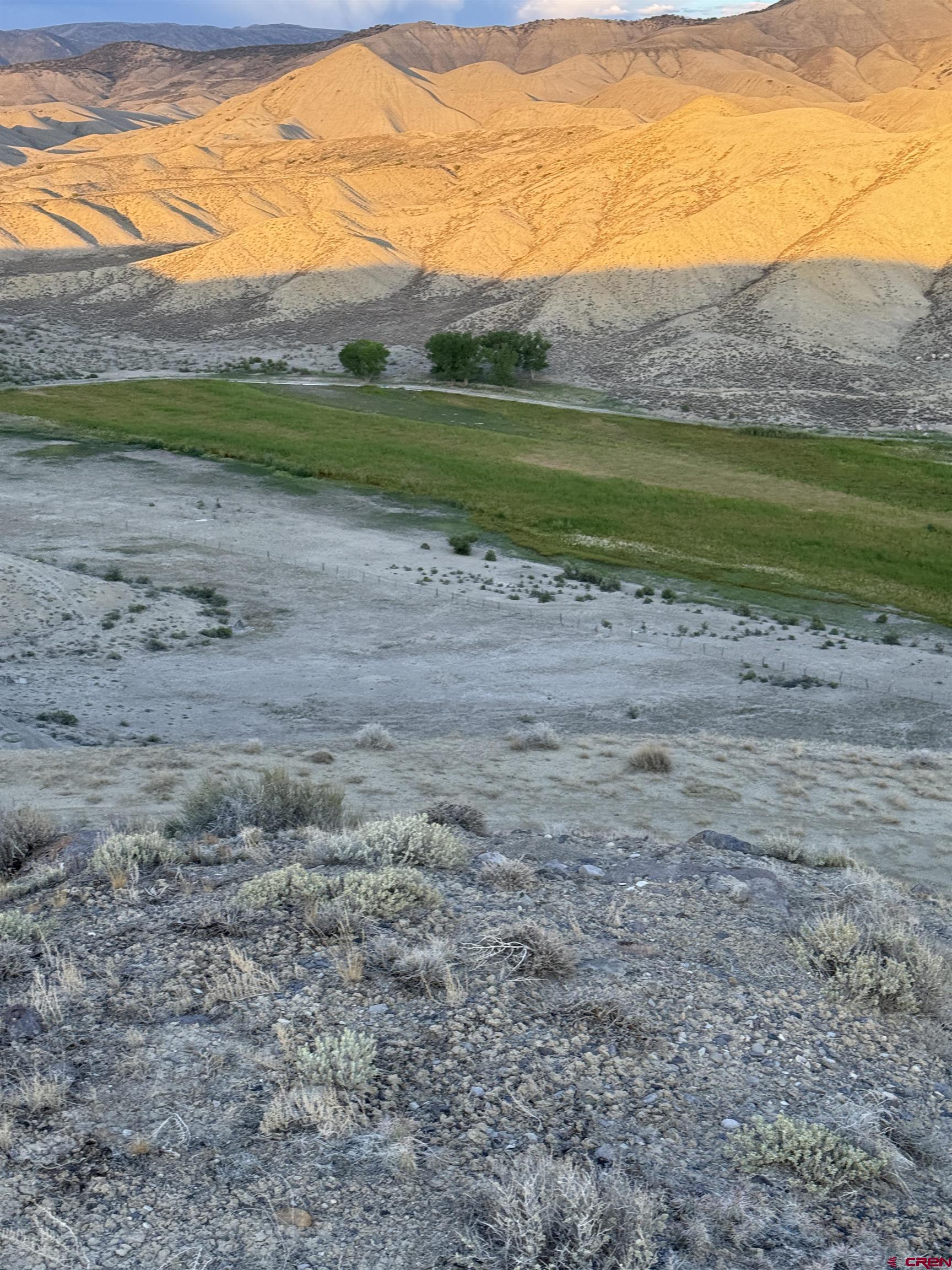 Tbd East Oak Grove Road Montrose, CO 81401 - Photo 11 of 18 a view of a lake with a mountain