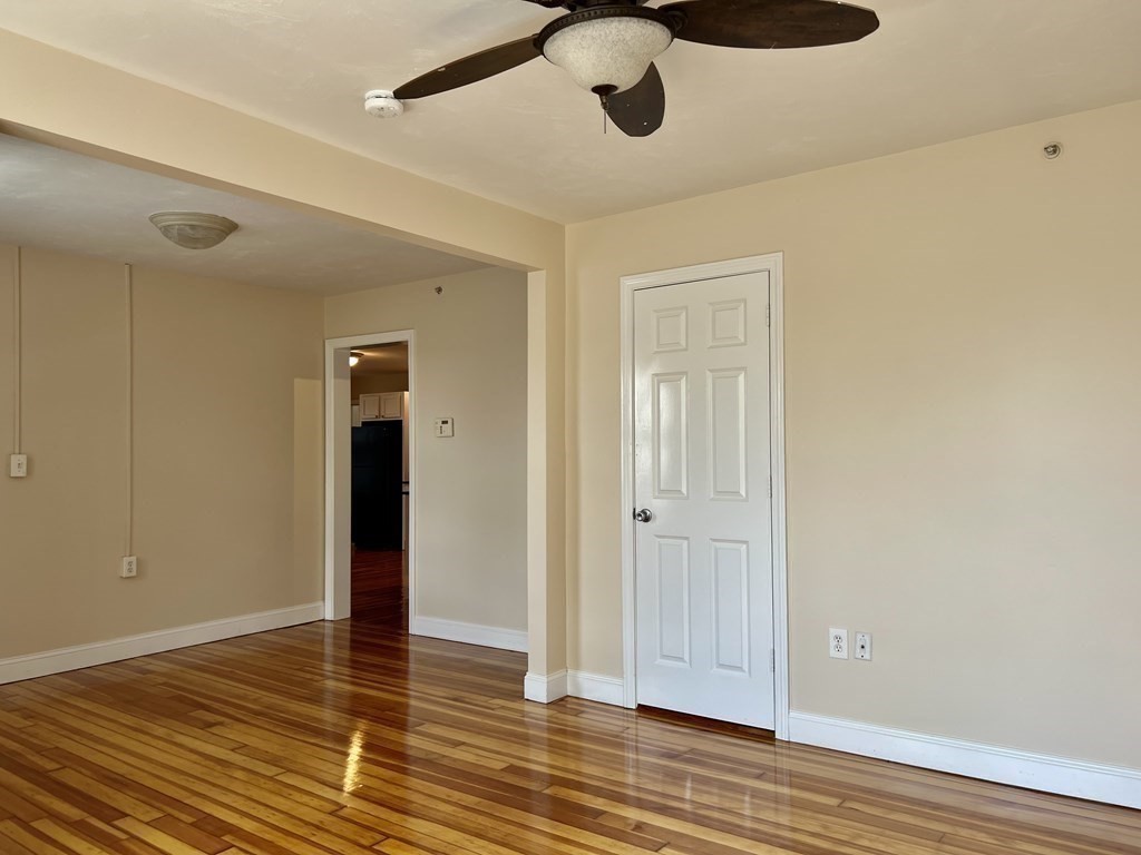 41 Harbor Street, Unit 3 Salem, MA 01970 - Photo 5 of 20 a view of empty room with wooden floor