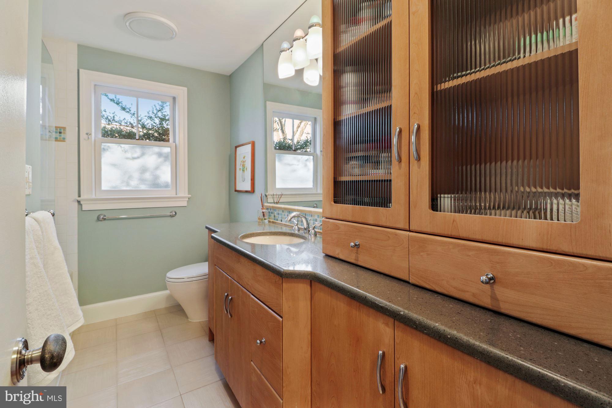 7201 Lenhart Drive Chevy Chase, MD 20815 - Photo 15 of 47 Hall Bath with ample cabinetry & storage
