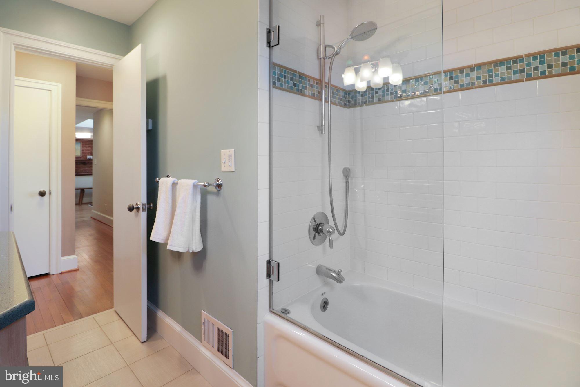 7201 Lenhart Drive Chevy Chase, MD 20815 - Photo 16 of 47 Hall Bath with tub, shower & radiant heated floor