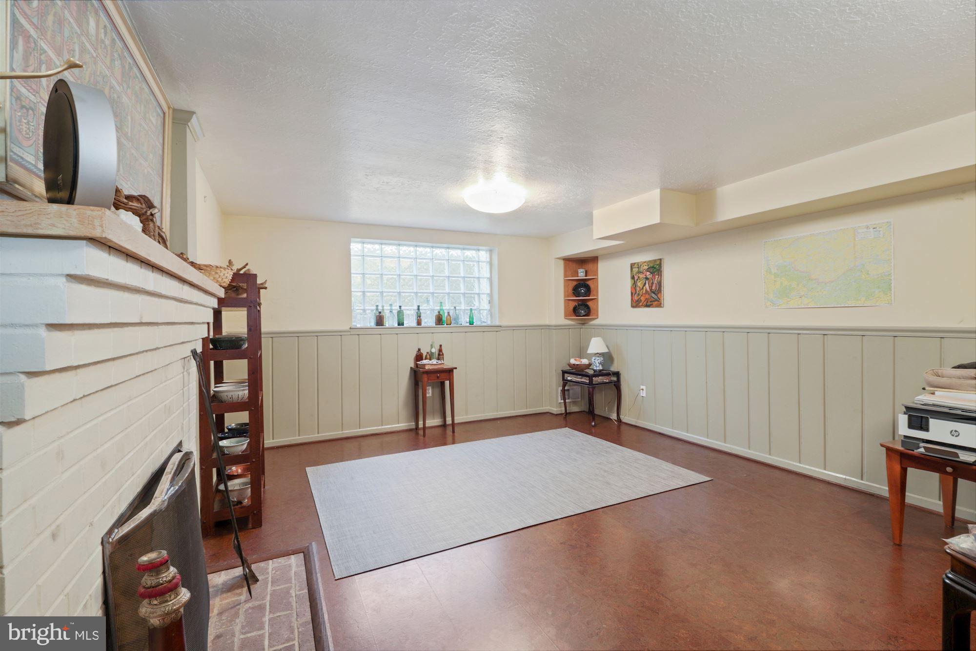 7201 Lenhart Drive Chevy Chase, MD 20815 - Photo 26 of 47 Lower level rec room