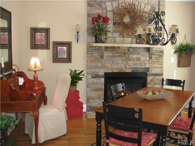 7300 Sparhawk Road Wake Forest, NC 27587 - Photo 5 of 12 Just off the kitchen is the "keeping room" a separate area that can be a sitting room or you can use as a breakfast area. There is also a breakfast area too, that these sellers are suging as the sitting area.
