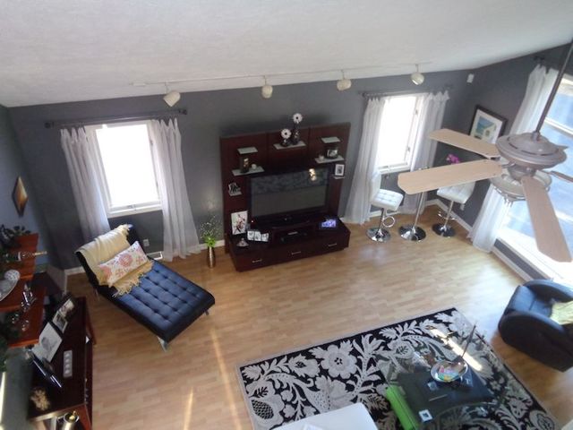 3720 East Flagg Road Ashton, IL 61006 - Photo 7 of 19 a living room with furniture and a table