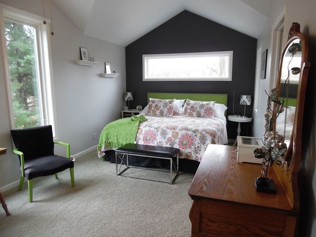 3720 East Flagg Road Ashton, IL 61006 - Photo 10 of 19 a bed sitting in a bedroom next to a window