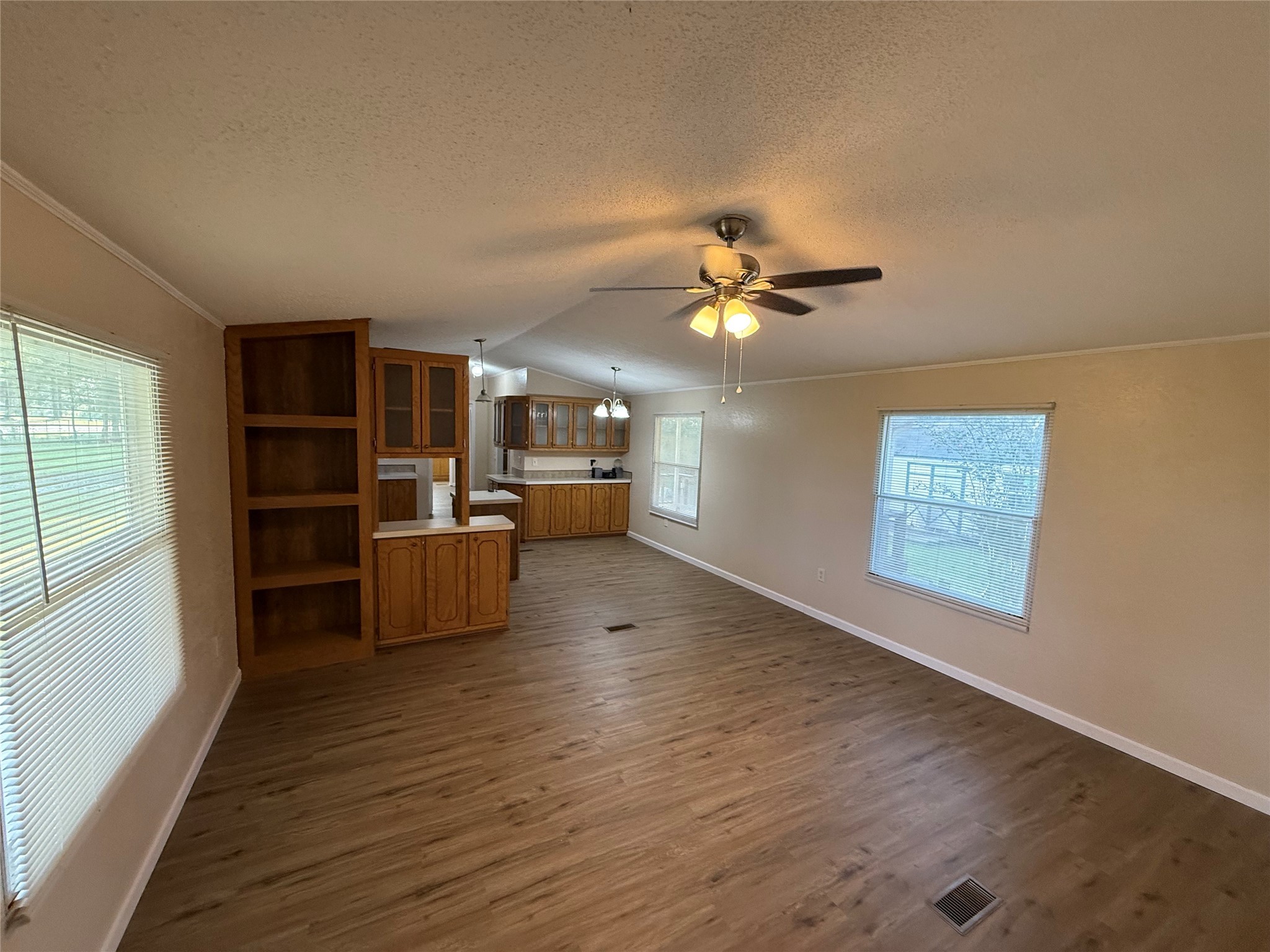 4813 Fm 357 Apple Springs Apple Springs, TX 75926 - Photo 14 of 32 a view of a livingroom with furniture and an empty room