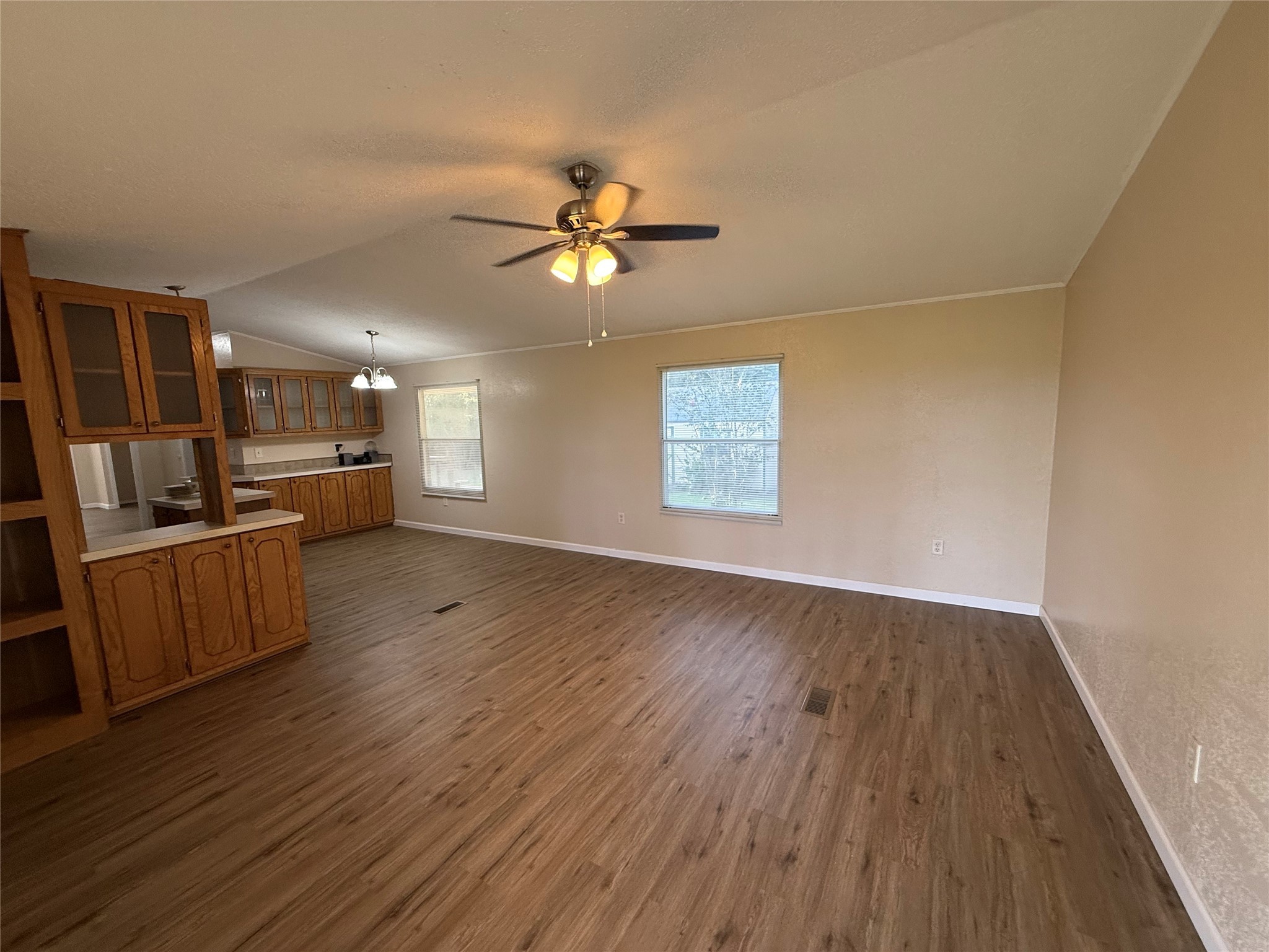 4813 Fm 357 Apple Springs Apple Springs, TX 75926 - Photo 15 of 32 a view of an empty room with a window and wooden floor