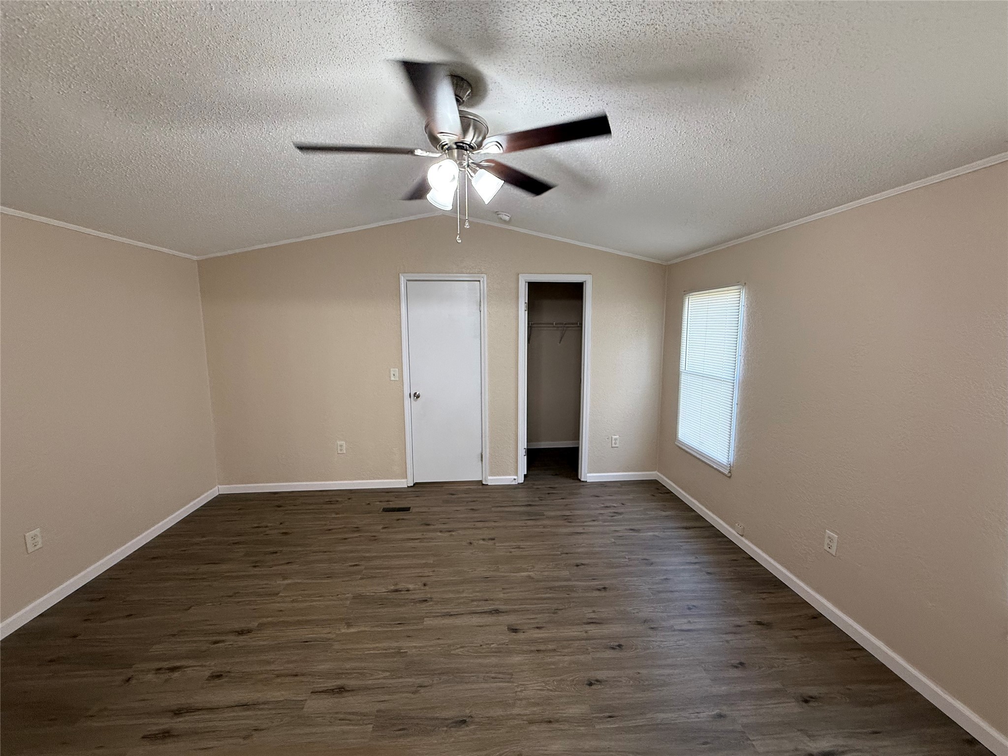 4813 Fm 357 Apple Springs Apple Springs, TX 75926 - Photo 24 of 32 wooden floor in an empty room with a window