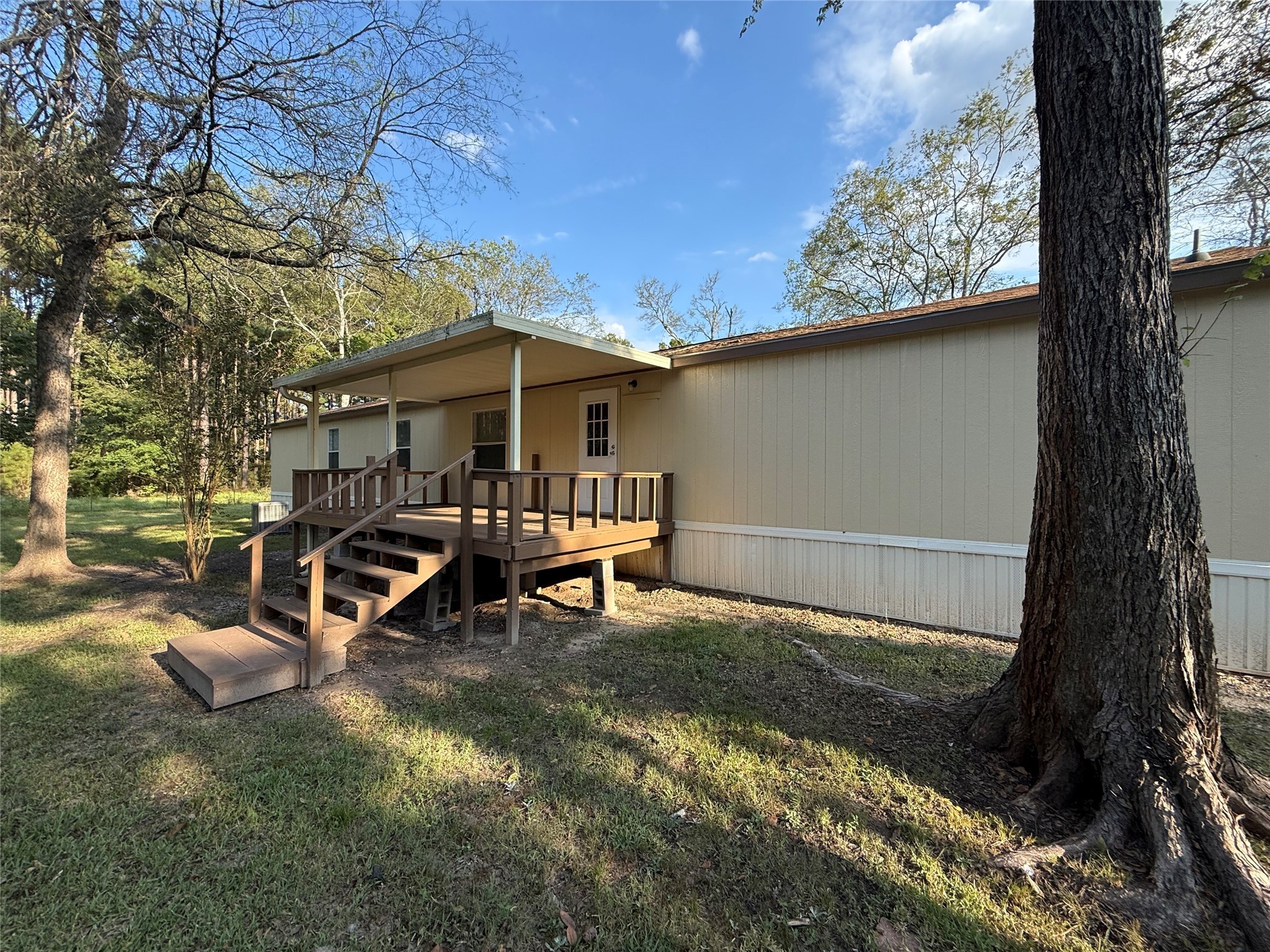4813 Fm 357 Apple Springs Apple Springs, TX 75926 - Photo 7 of 32 a view of a outdoor space with a patio and a fire pit