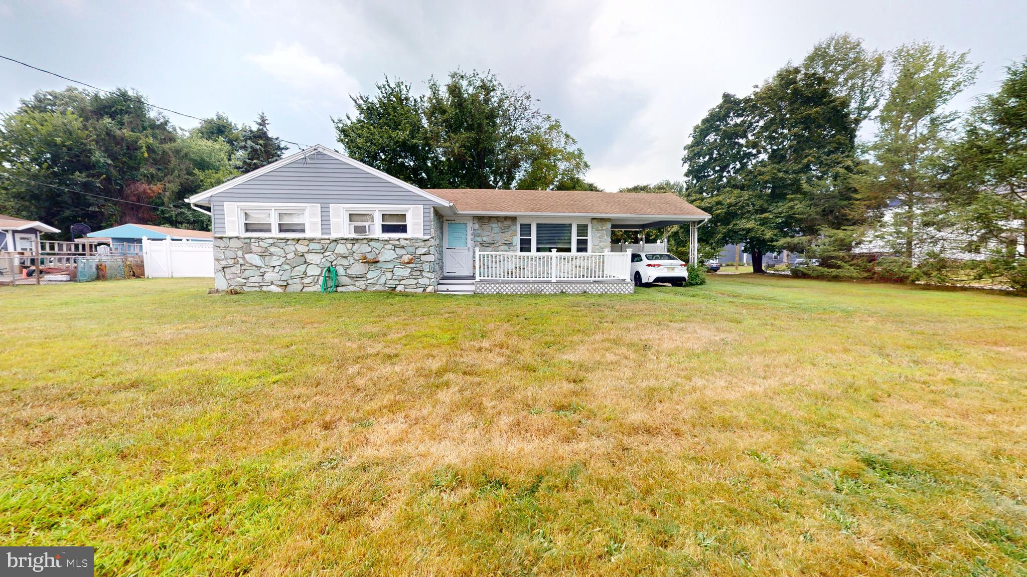 1401 Filbert Street Glassboro, NJ 08028 - Photo 1 of 18 a front view of a house with swimming pool