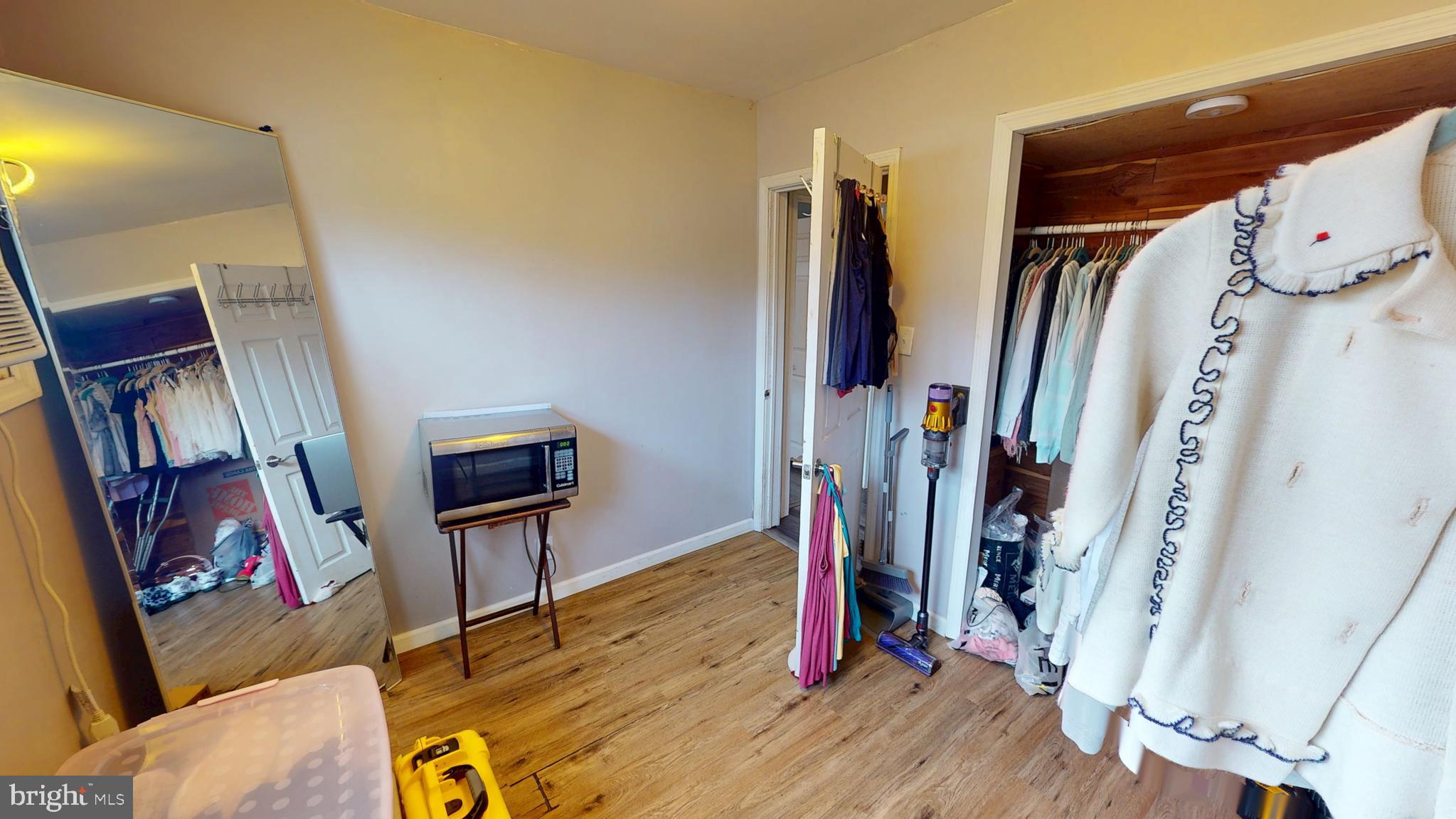 1401 Filbert Street Glassboro, NJ 08028 - Photo 14 of 18 a view of a livingroom with wooden floor and furniture