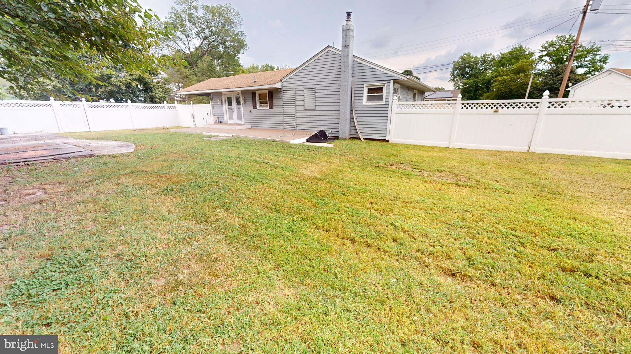 1401 Filbert Street Glassboro, NJ 08028 - Photo 16 of 18 a view of house with swimming pool