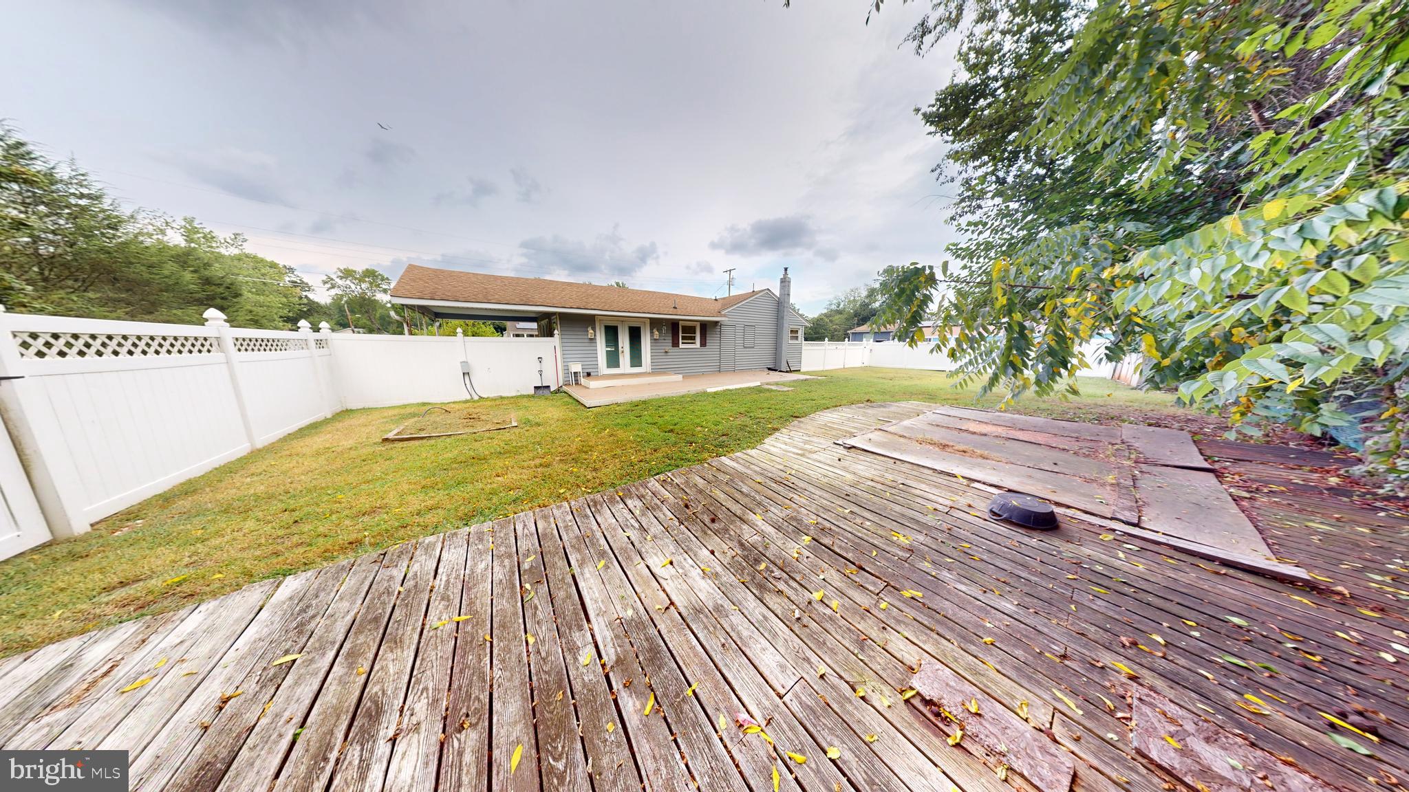 1401 Filbert Street Glassboro, NJ 08028 - Photo 17 of 18 a view of a house with wooden floor