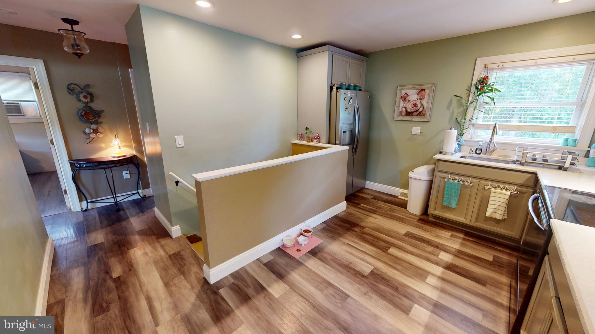 1401 Filbert Street Glassboro, NJ 08028 - Photo 7 of 18 a living room with furniture and a wooden floor