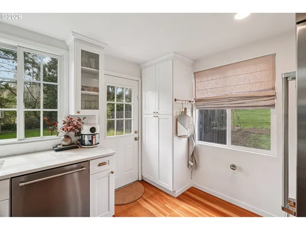 a view of a sink and a window