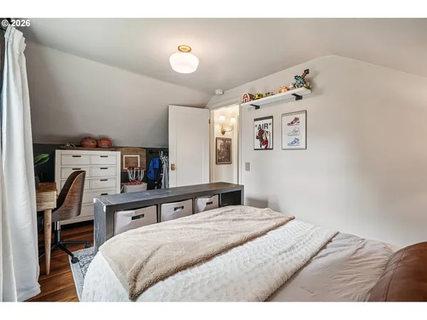 a bedroom with a bed and furniture