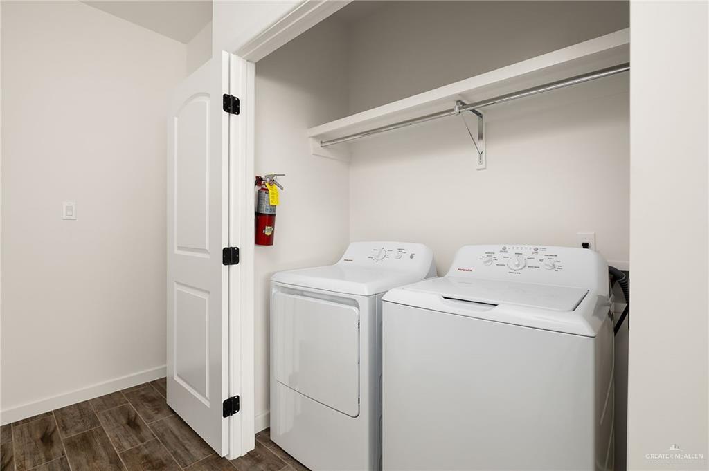 2608 Robin Road Weslaco, TX 78596 - Photo 8 of 14 a utility room with dryer and washer