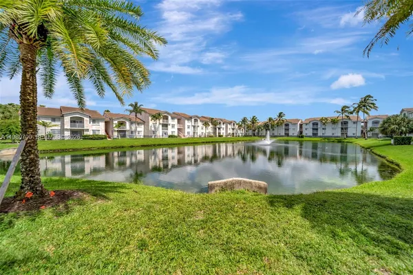 a view of a lake with a houses