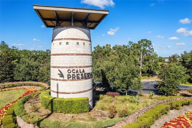 a view of a swimming pool with a yard