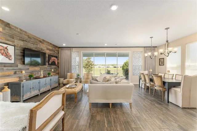 a large kitchen with kitchen island granite countertop a sink and stove