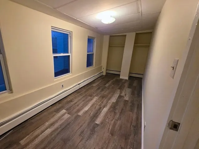 a view of an empty room and window