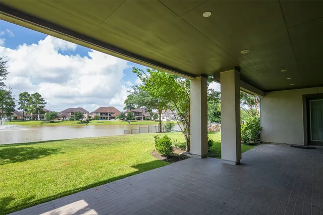 a view of a lake with a garden