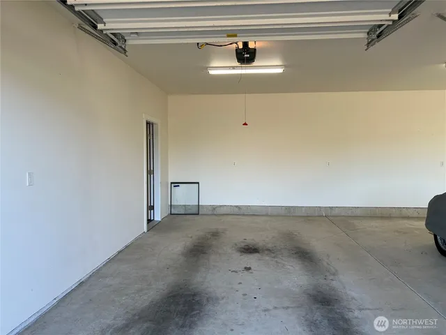 an aerial view of a house with a garden