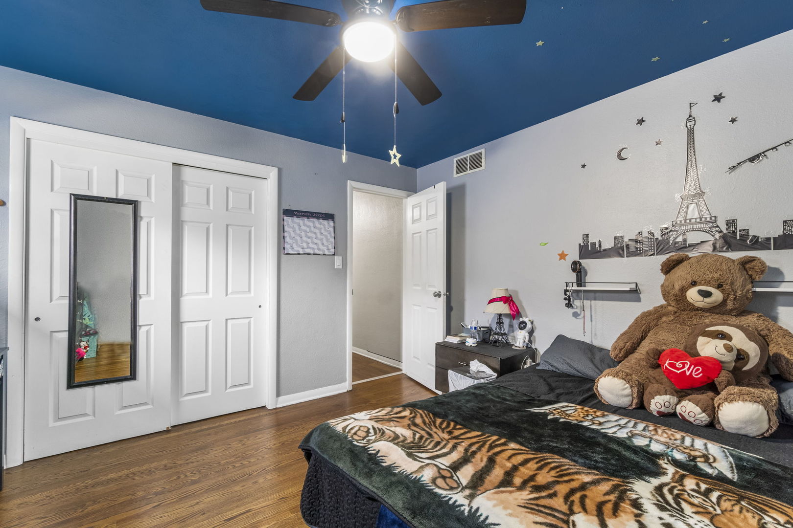208 South Reed Street Joliet, IL 60436 - Photo 8 of 18 a bedroom with furniture and a chandelier