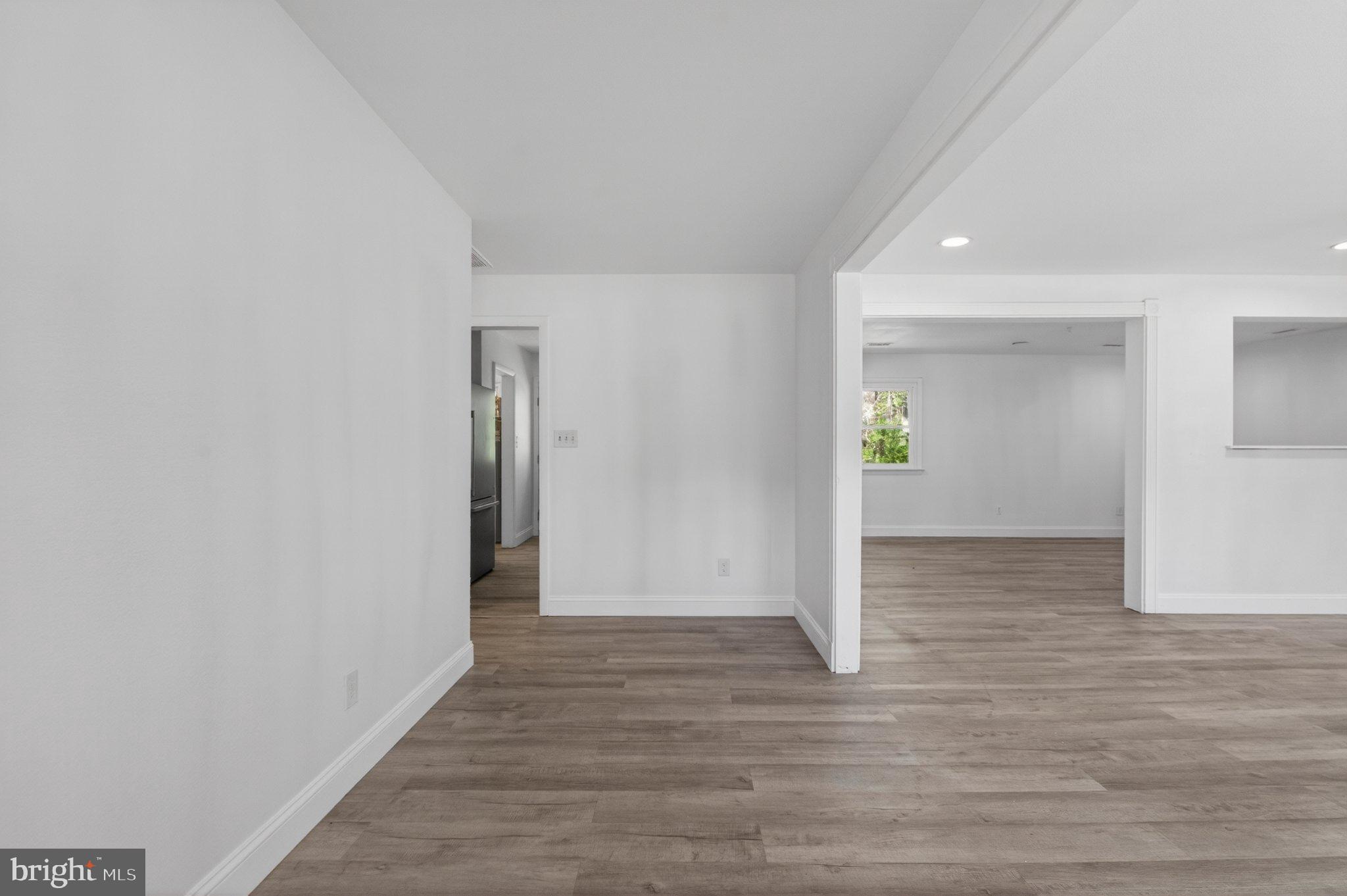 45278 Cove Manor Road California, MD 20619 - Photo 7 of 24 Spacious, light-filled living area.