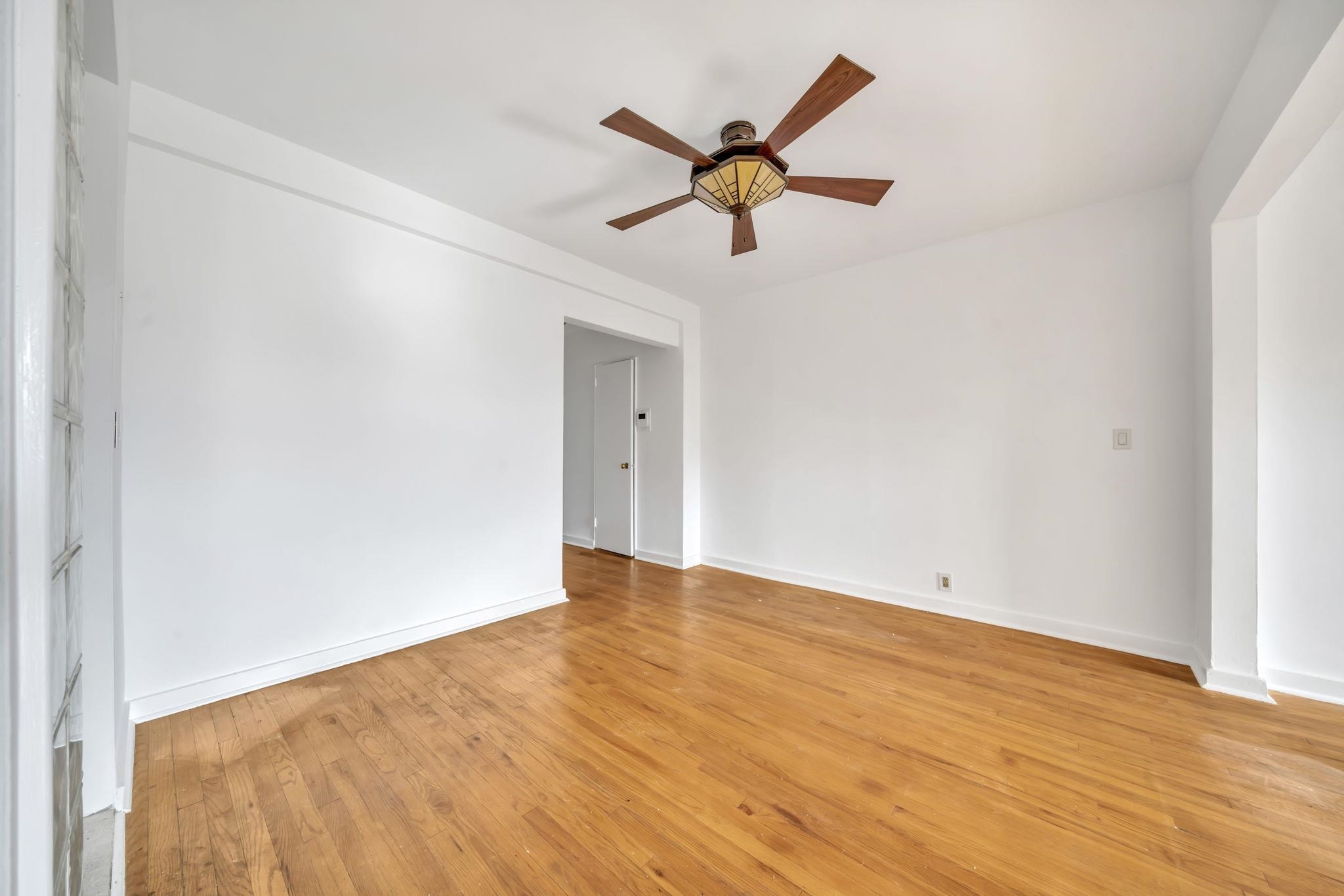 8450 Boulevard East, Unit 4F North Bergen, NJ 07047 - Photo 18 of 22 a view of a big room with wooden floor and closet in a room