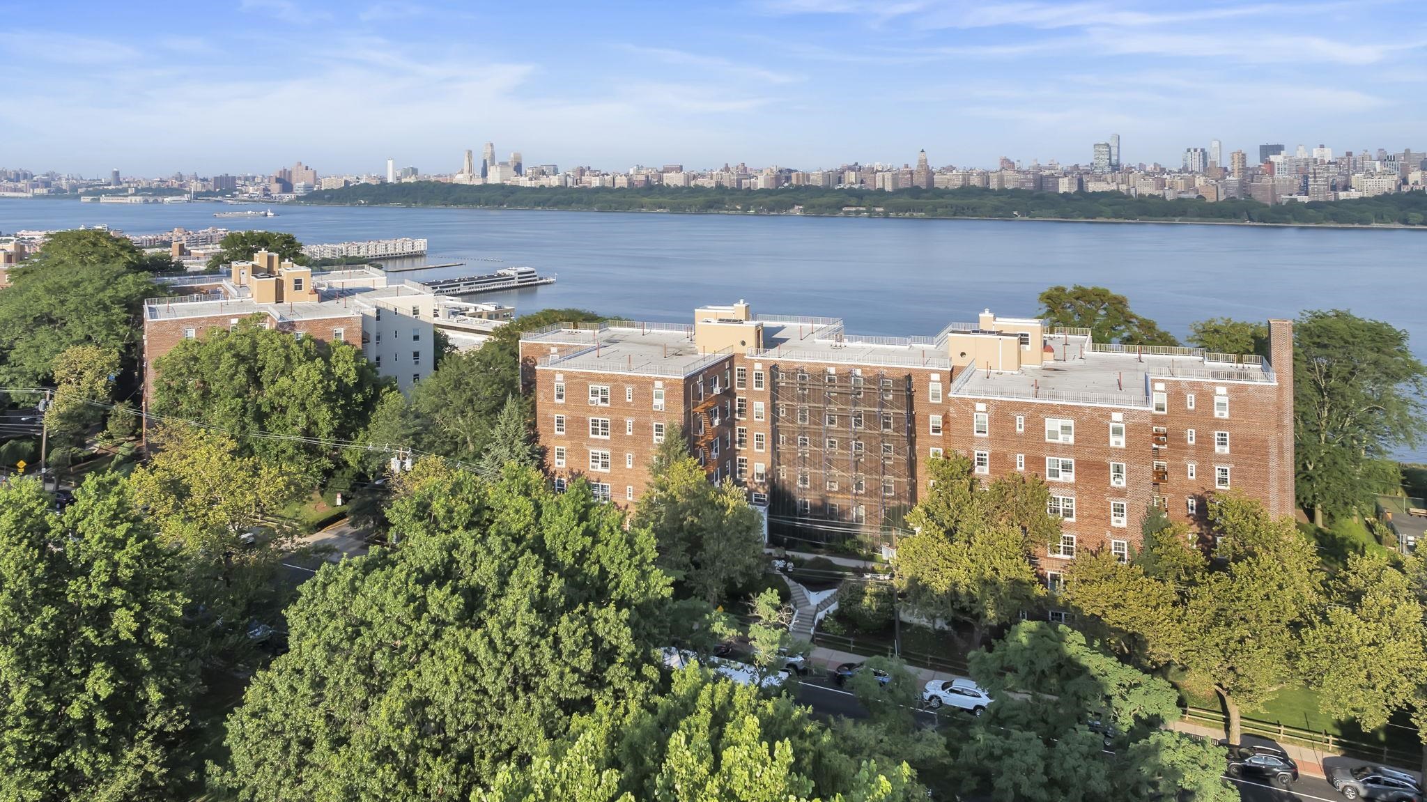 8450 Boulevard East, Unit 4F North Bergen, NJ 07047 - Photo 22 of 22 a view of a lake with building in the back