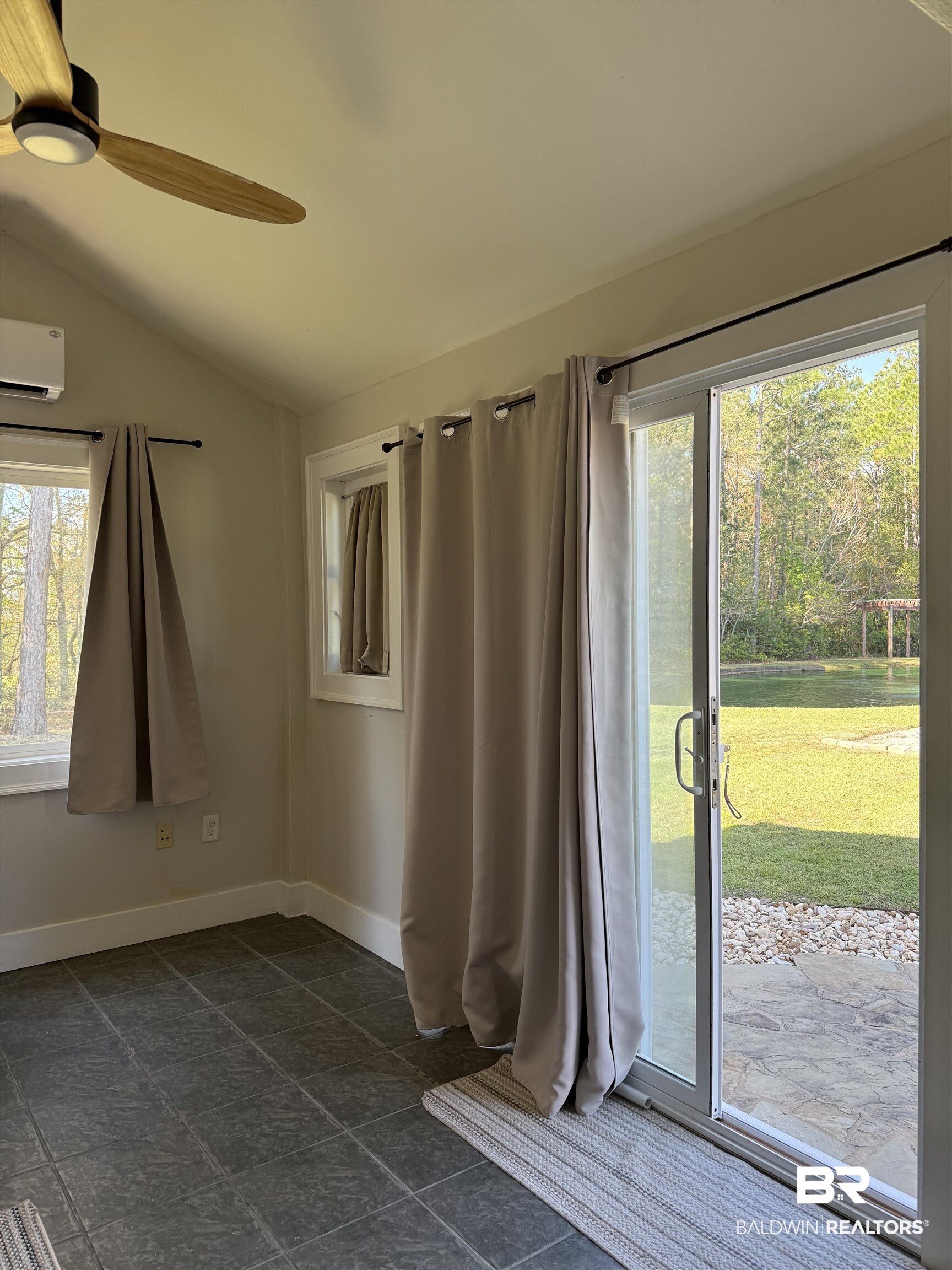 28114 Preserve Trail, Unit 190 Elberta, AL 36530 - Photo 20 of 69 Full bathroom with lofted ceiling, a ceiling fan, and a shower with shower curtain