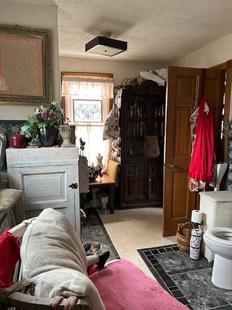 2665 East Sherrill Road Minooka, IL 60447 - Photo 11 of 23 a bedroom with a bed and window