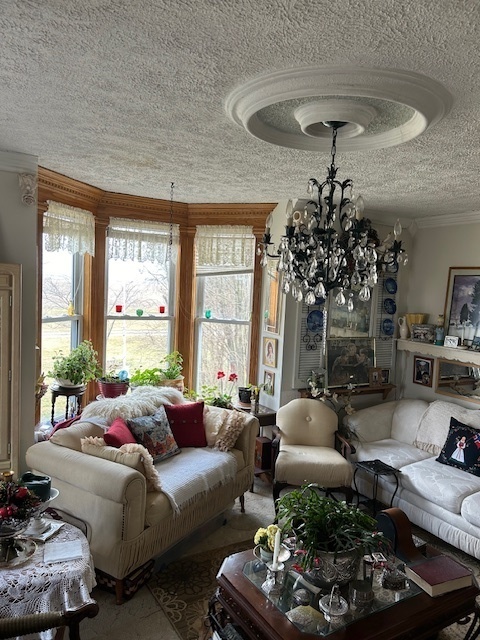 2665 East Sherrill Road Minooka, IL 60447 - Photo 17 of 23 a living room with furniture and a large window