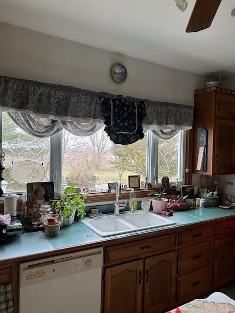2665 East Sherrill Road Minooka, IL 60447 - Photo 9 of 23 a kitchen with a sink and a cabinets