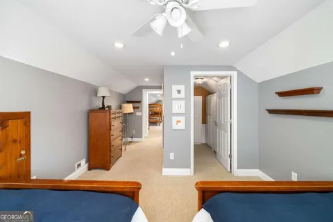 a view of house with a large space and a yard