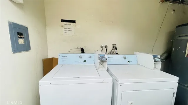 a picture of a bathroom with a sink and wooden floor