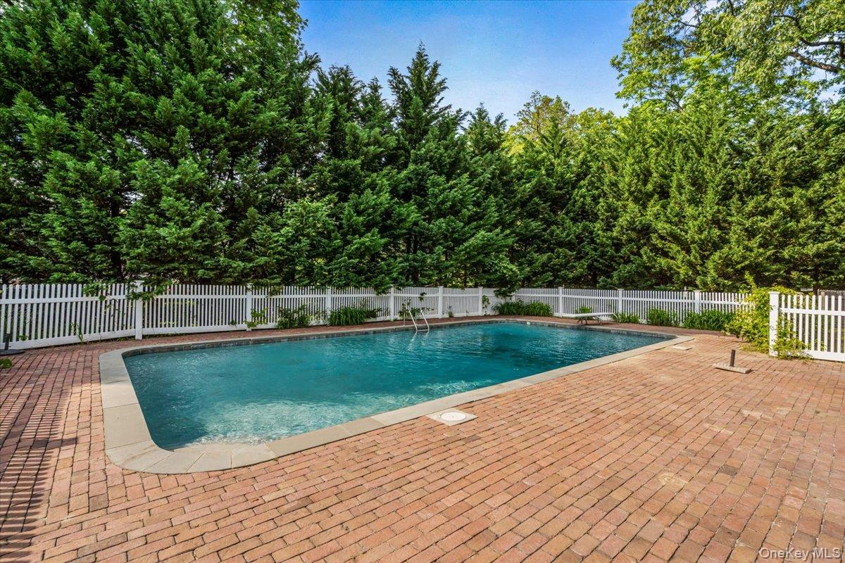 130 Sands Point Road Sands Point, NY 11050 - Photo 25 of 26 View of swimming pool with a fenced backyard and a patio