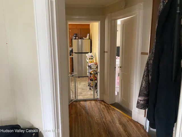 a bathroom with a toilet and a shower curtain