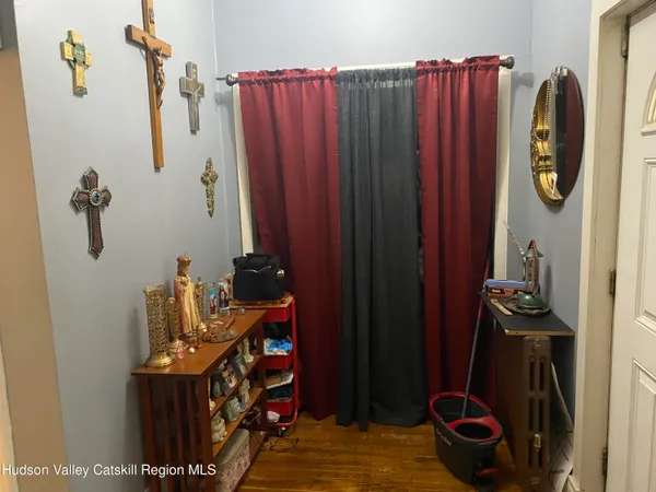 a room with furniture and a potted plant