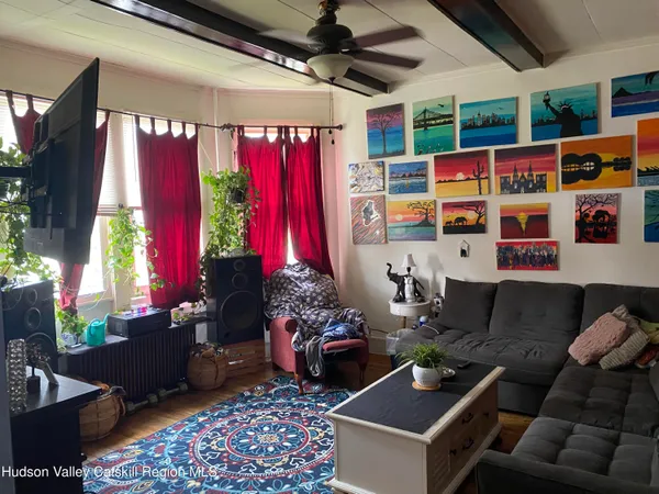 a room with gym equipment and a table