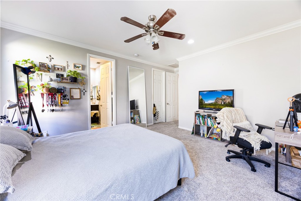 20668 Pitchfork Drive Riverside, CA 92507 - Photo 14 of 25 a bedroom with furniture and a bed