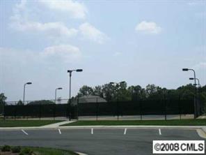 2007 Potomac Road, Unit AD79 Indian Trail, NC 28079 - Photo 5 of 8 a view of a tennis court