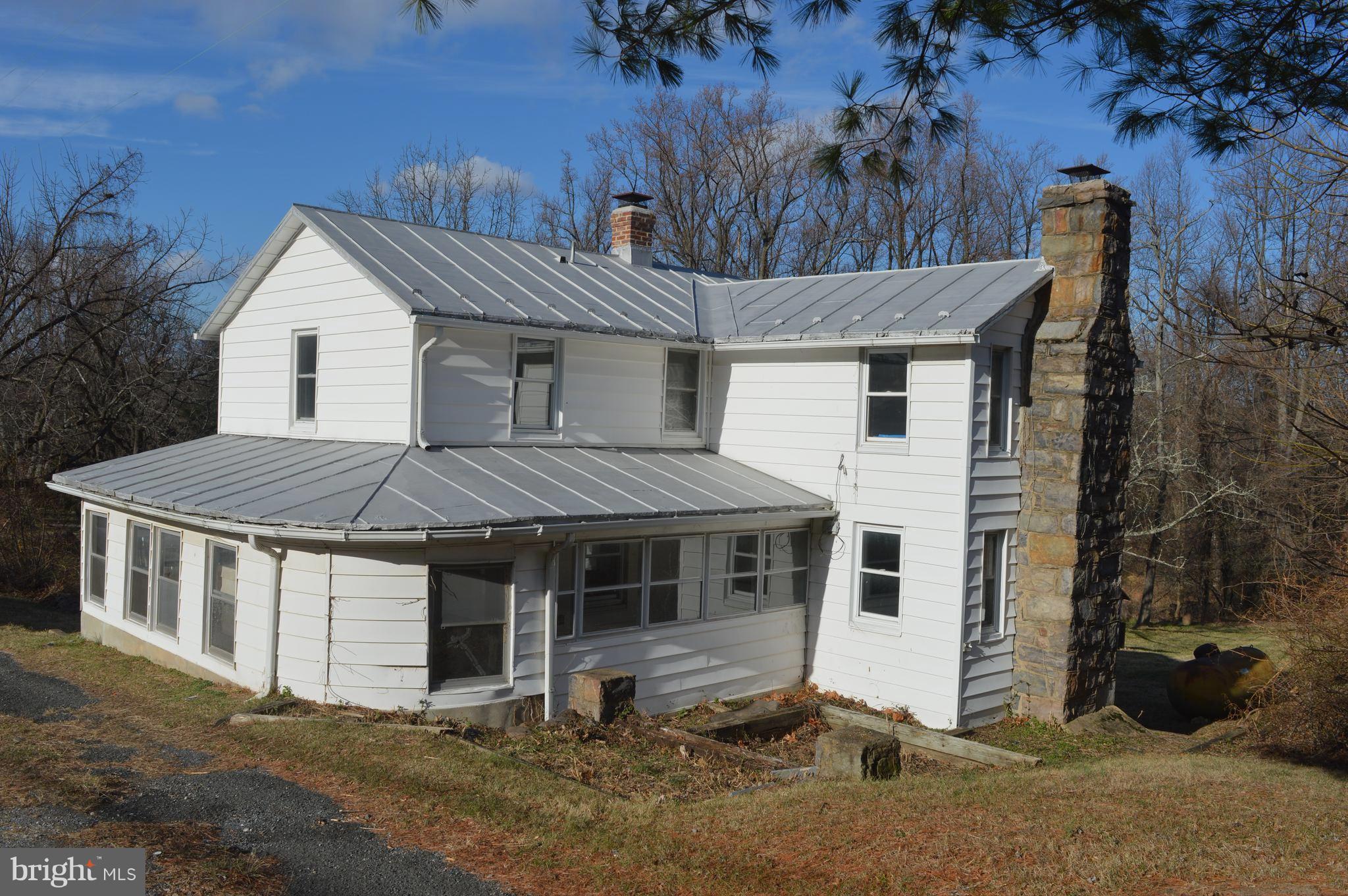 709 Pine Grove Road Bluemont, VA 20135 - Photo 2 of 23 Walk around porch to the kitchen.