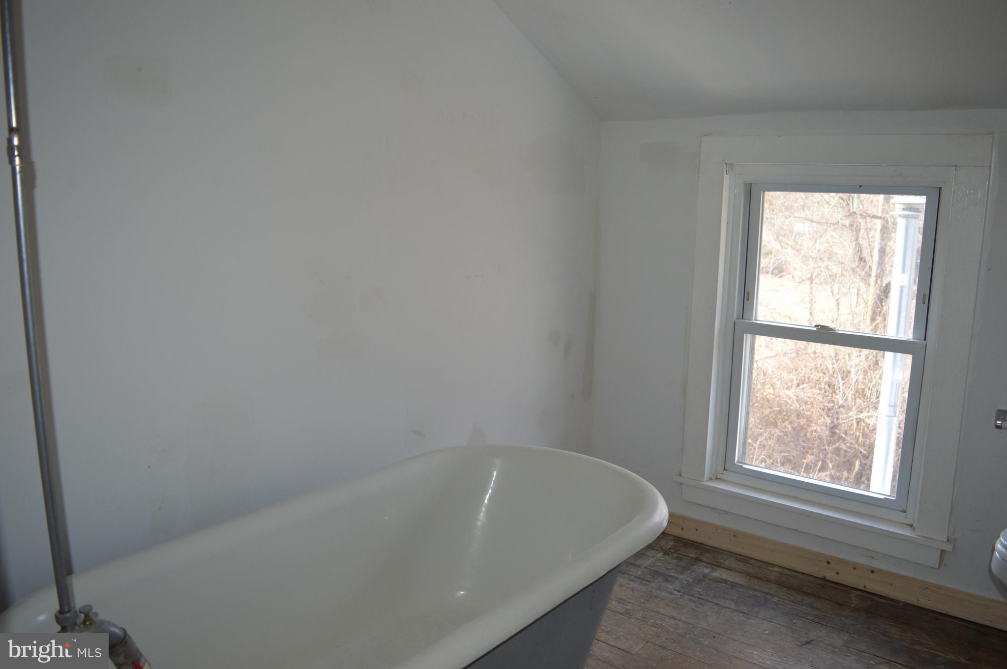 709 Pine Grove Road Bluemont, VA 20135 - Photo 11 of 23 Upstairs bathroom with craw foot tub.