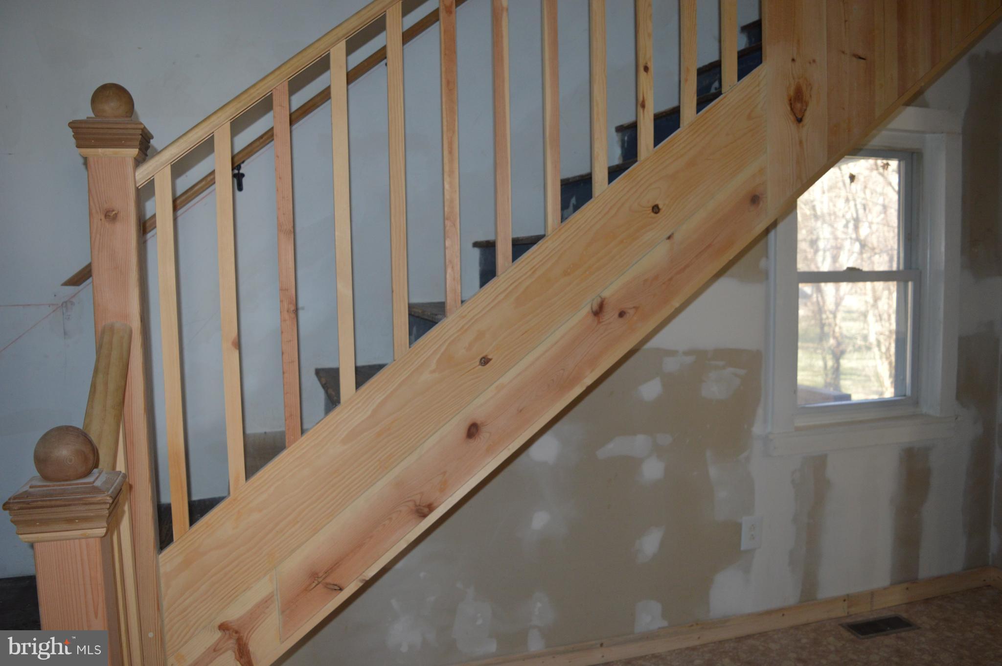 709 Pine Grove Road Bluemont, VA 20135 - Photo 13 of 23 Stairs are waiting for some paint or stain.